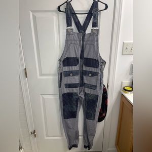 Blue Pinstripe jumper with plaid patches.